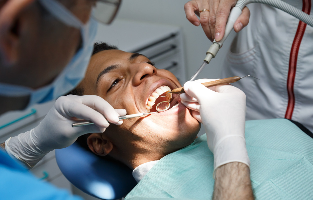 dentists performing dental work