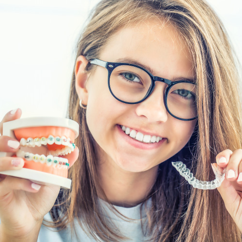 girl smiling with invisalign