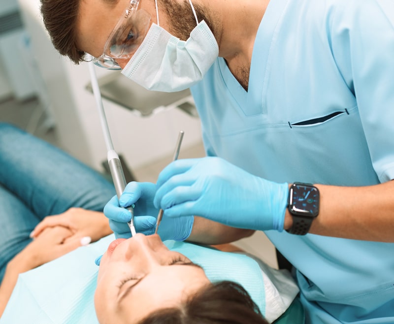 dentist with dental patient