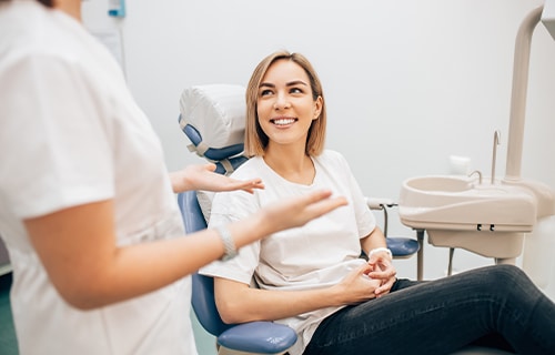 woman smiling in dentist chair